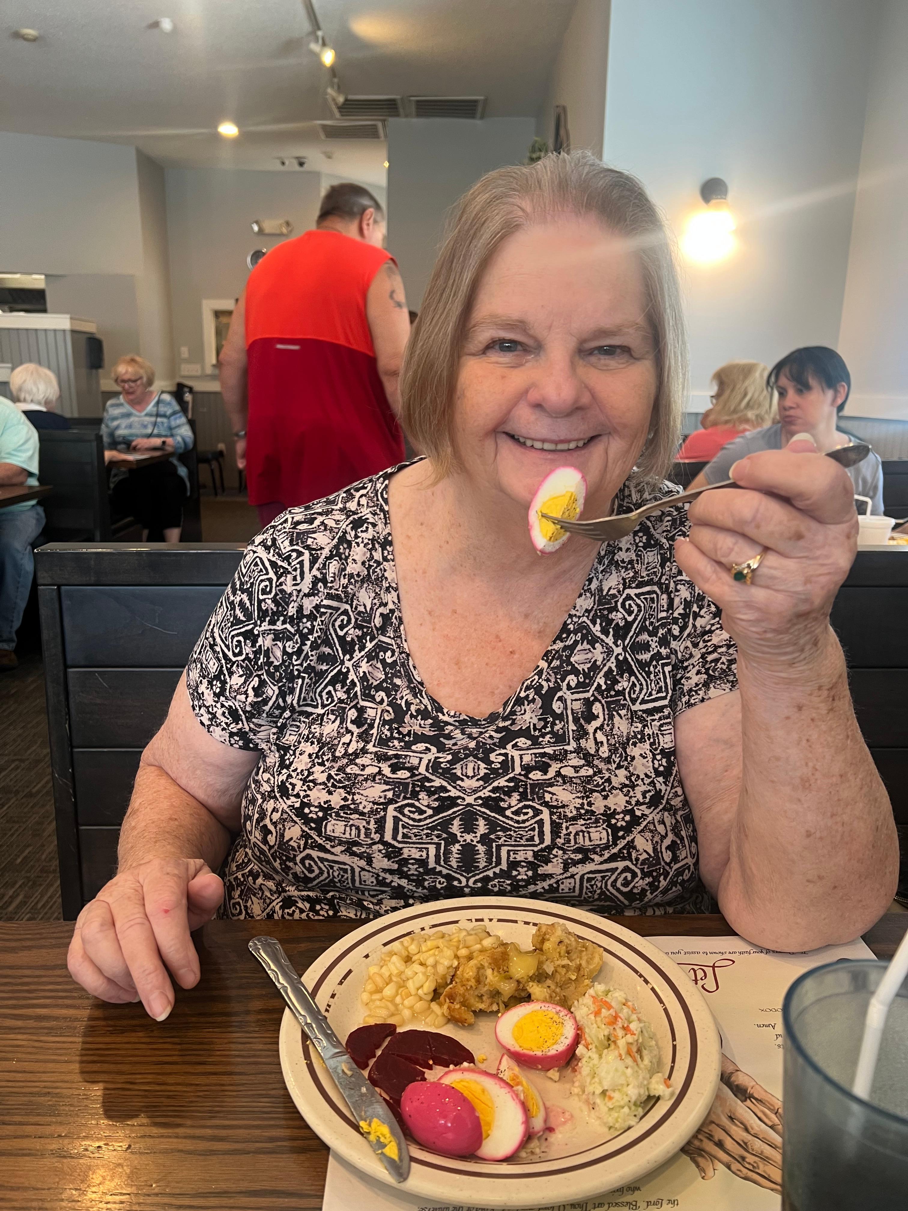 Karen (birthday girl) with red beet eggs from Dieners in Lancaster. Amish buffet 