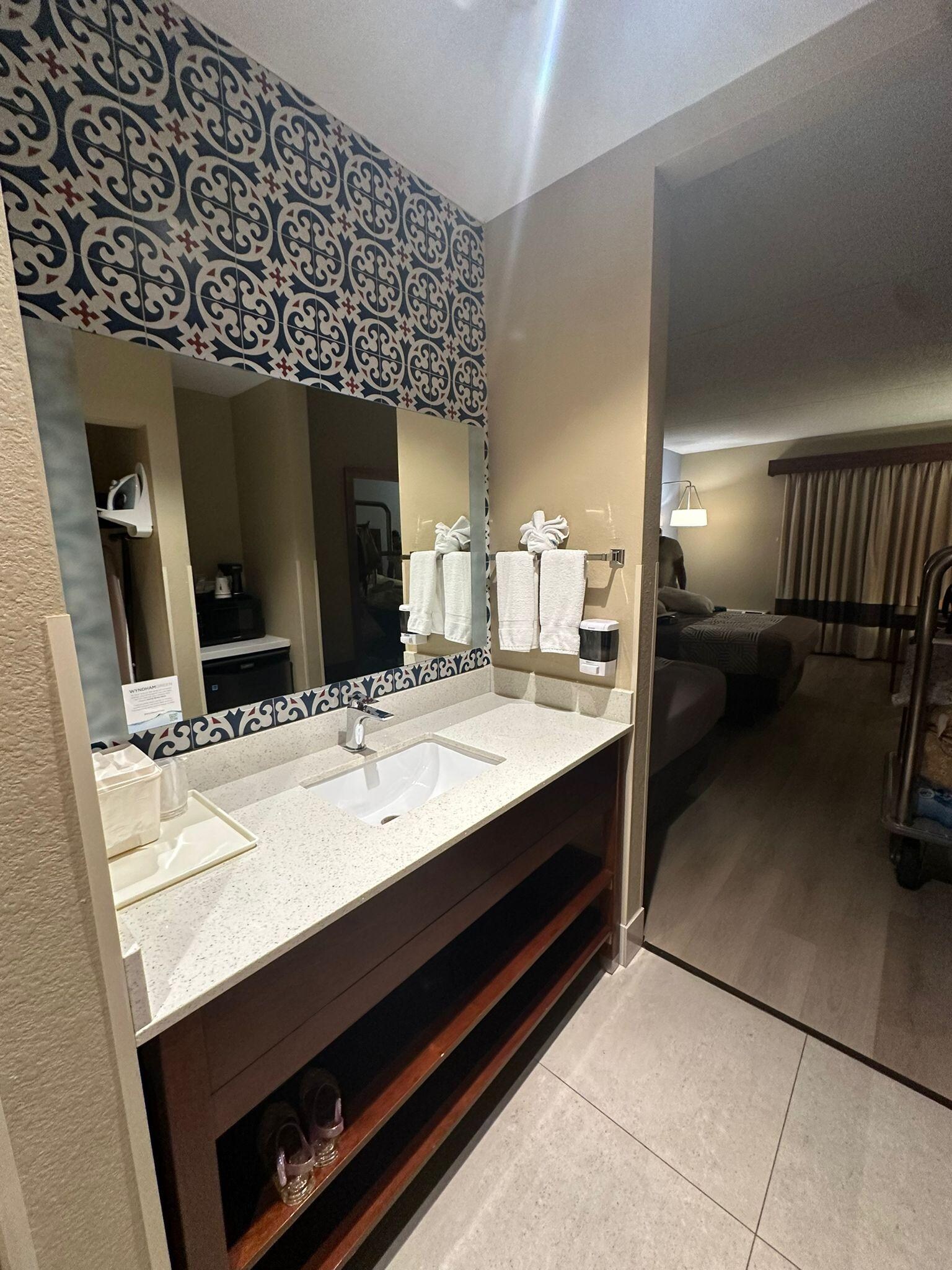 There are two sinks, one inside the bathroom and one outside. This makes it much easier for guests to use.