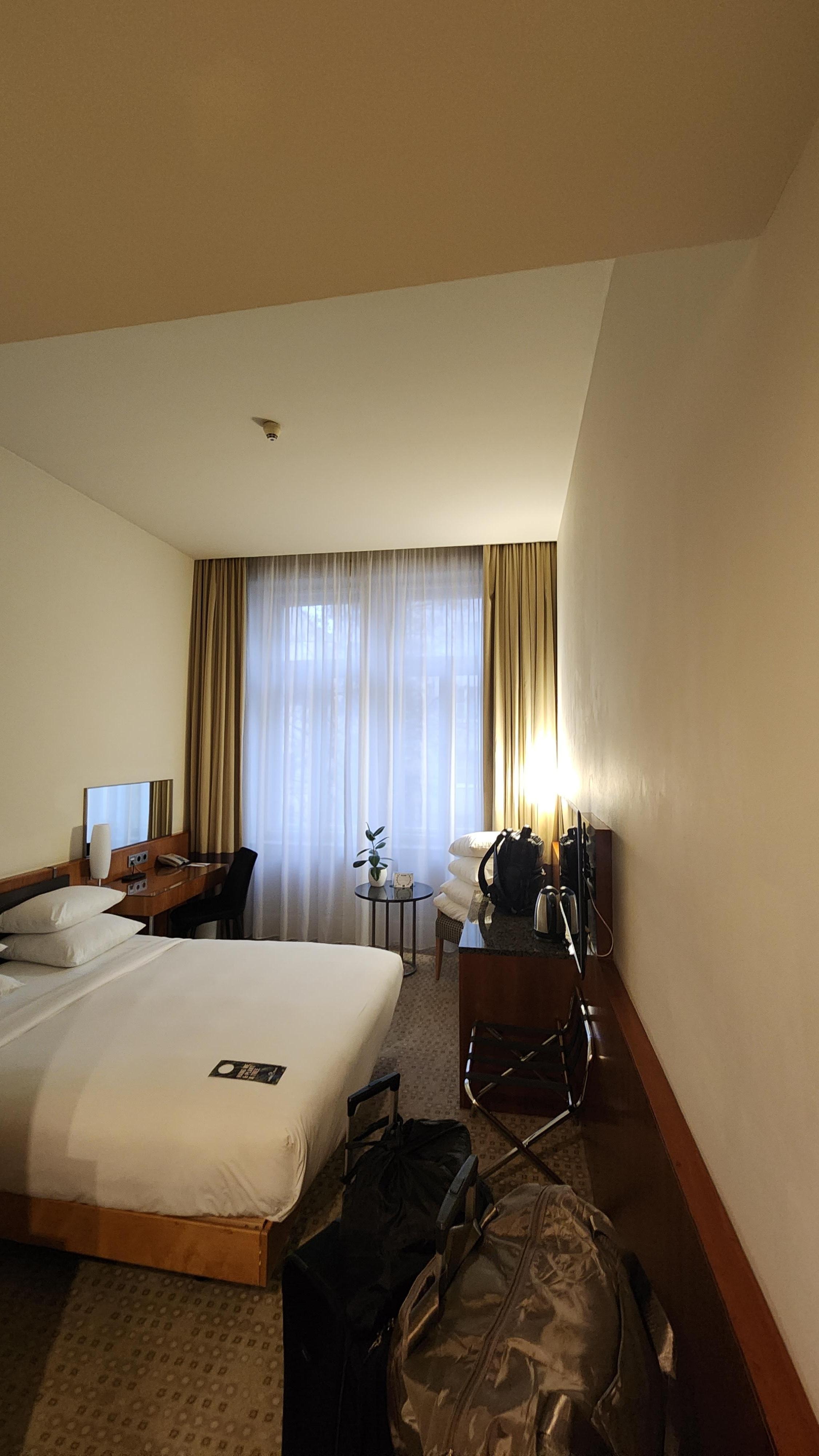 Room was cozy with very high ceilings