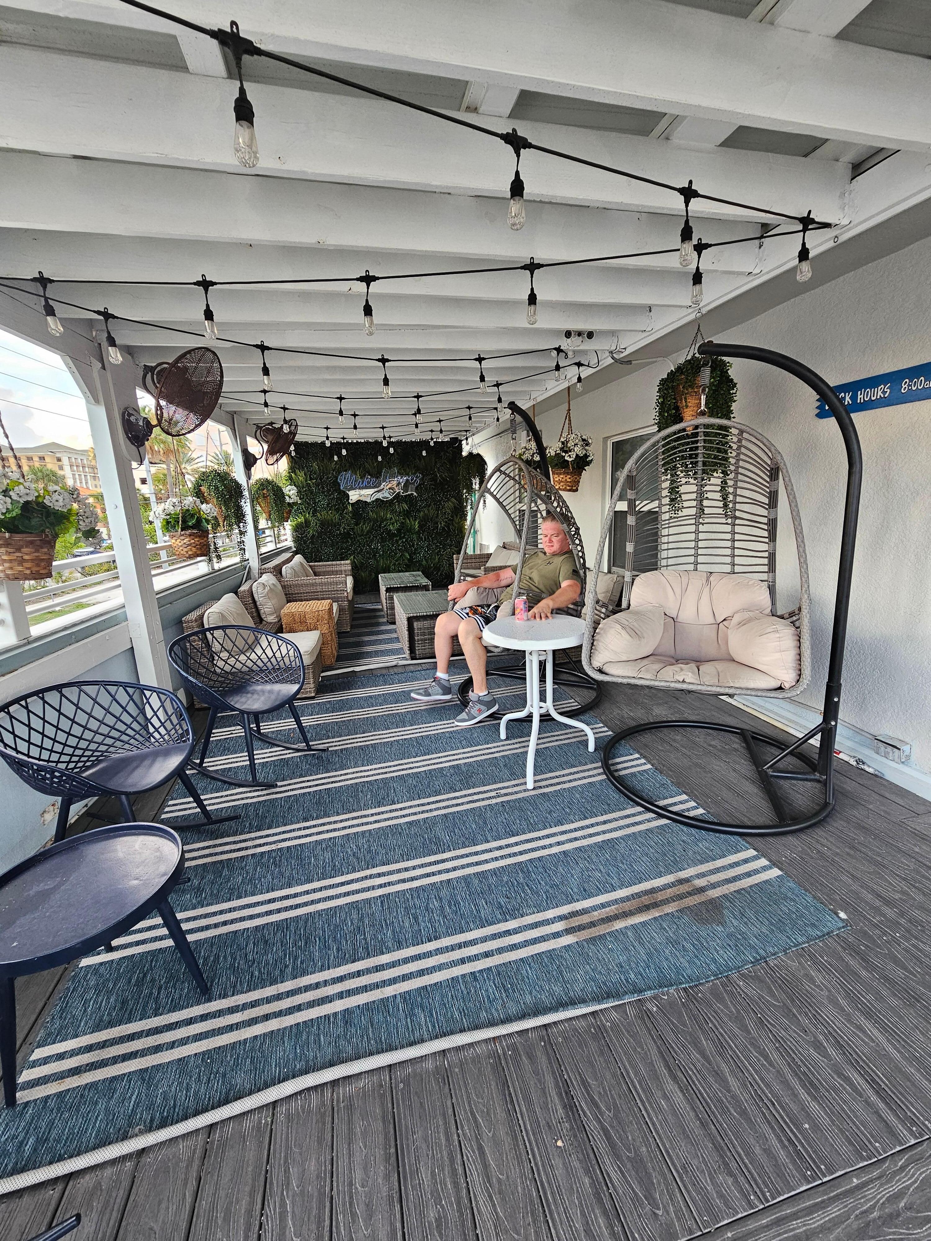 Hotel has super comfy outdoor patio with fans