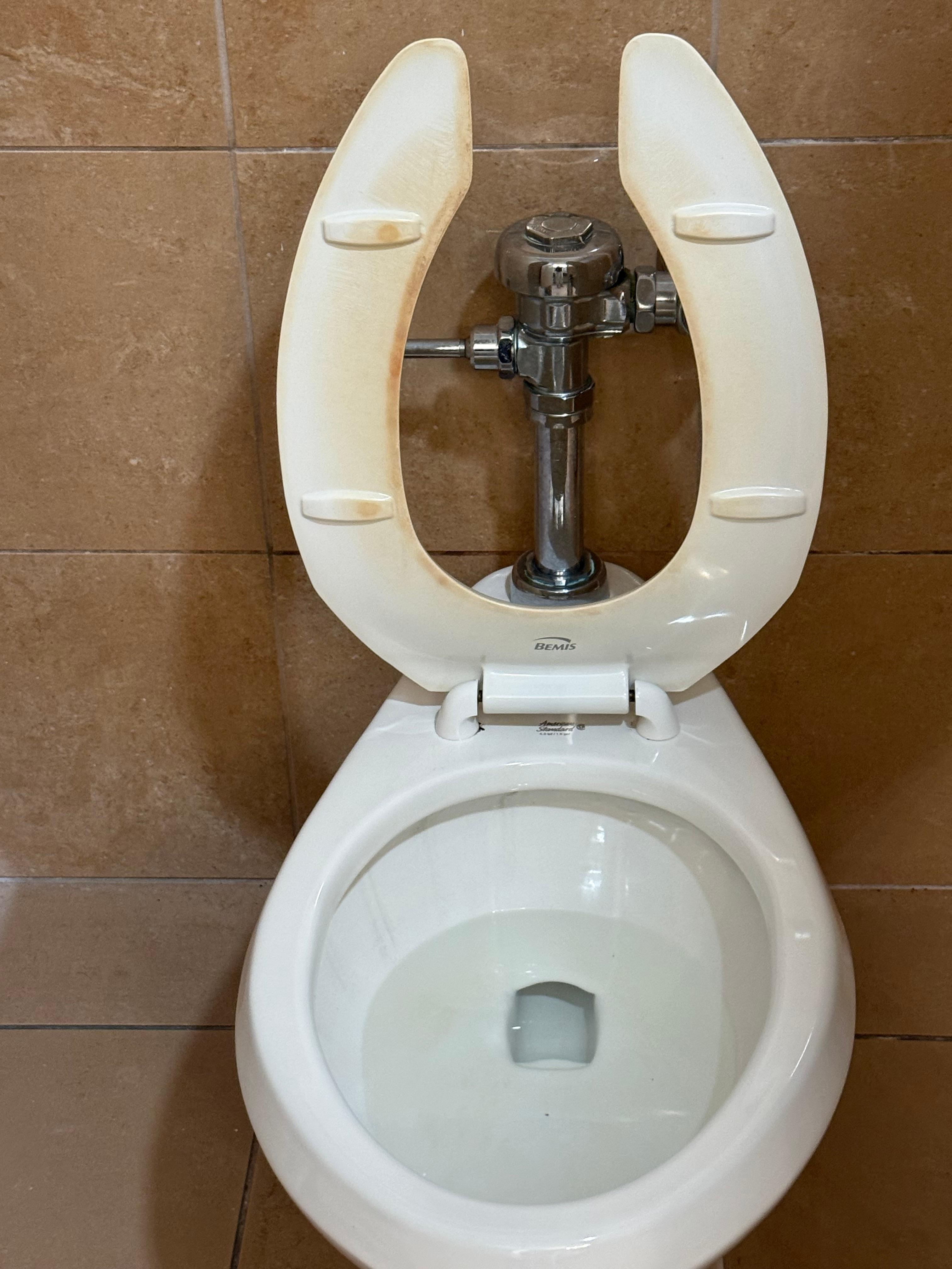 Mail lobby bathroom. Looks more like a gas station than a hotel. 