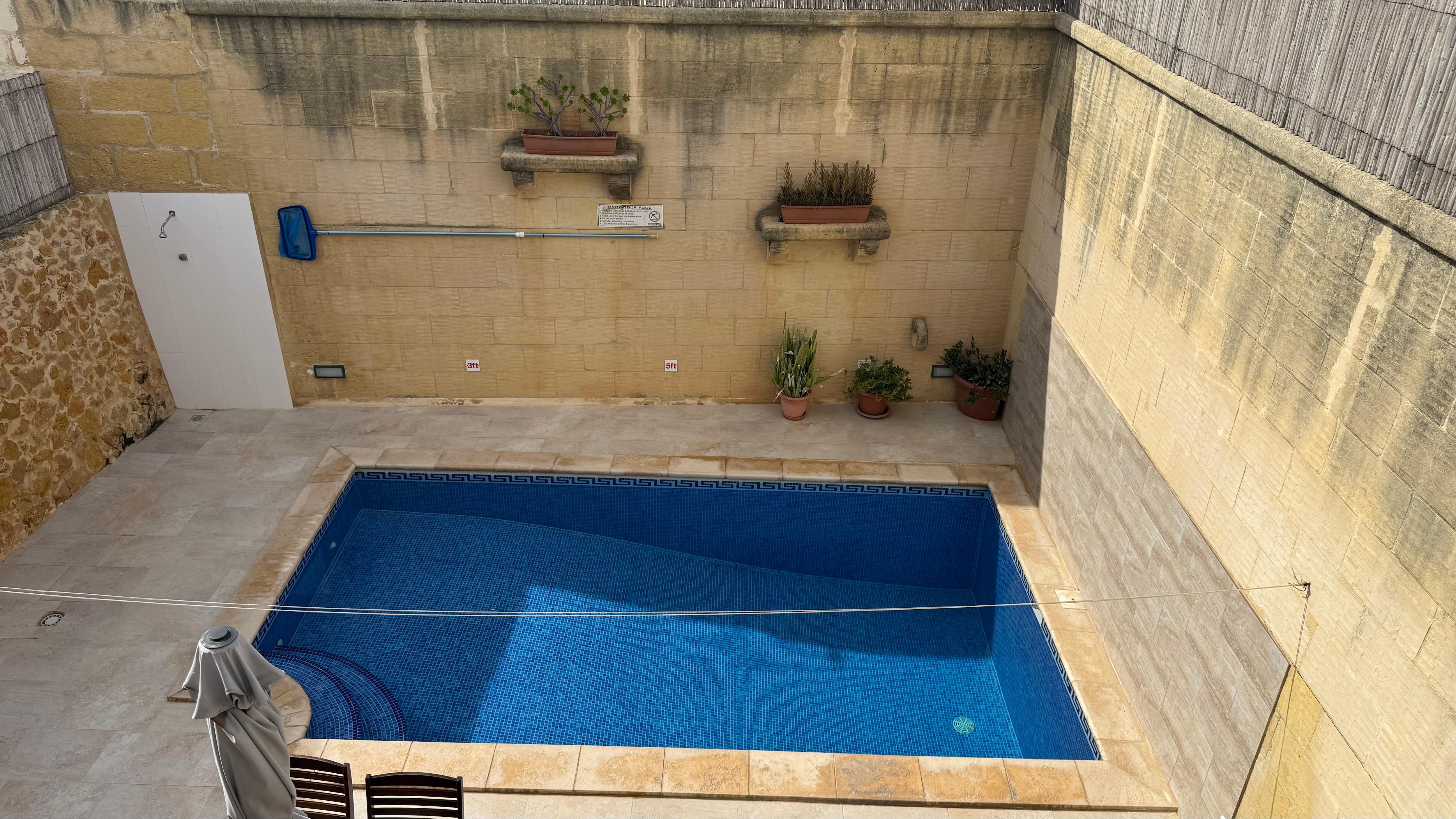 View of pool from
Upstairs master suite 