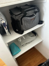 Iron, lunchkit, beach mat, and huge laundry bag! It held all of our clothes (family of 4) for an entire week!