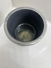 toothbrush holder in master bath full of thick liquid