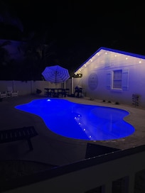 The pool was with beautiful lights at night.