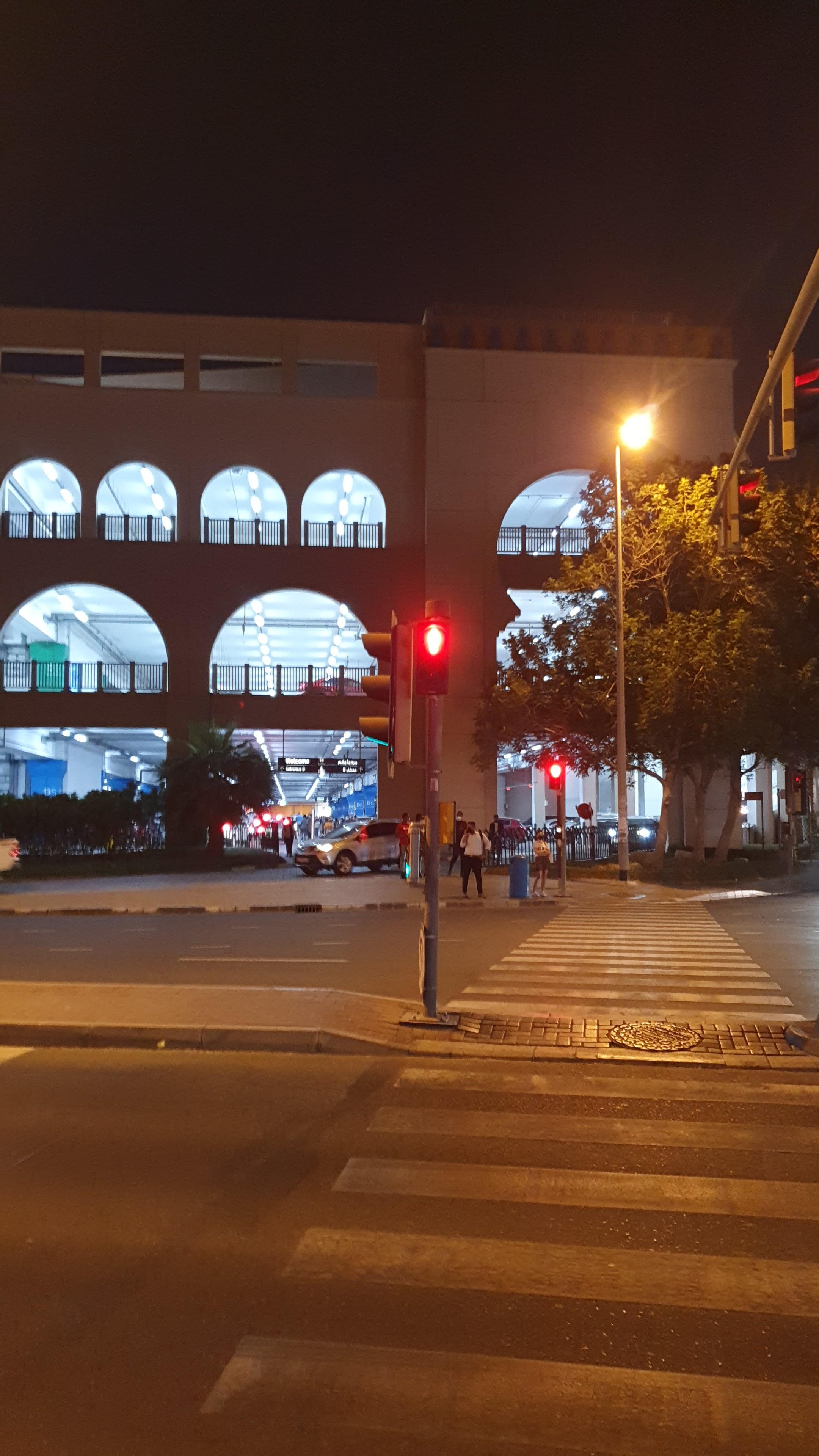 Traffic lights and a car park at the Mall