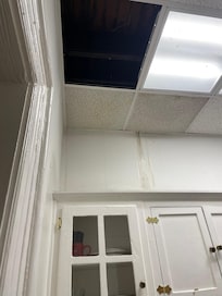 Ceiling tiles fell in from leak