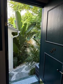 Back entrance to bungalow leading to garden