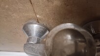 Dirty and unsafe chrome in bathroom