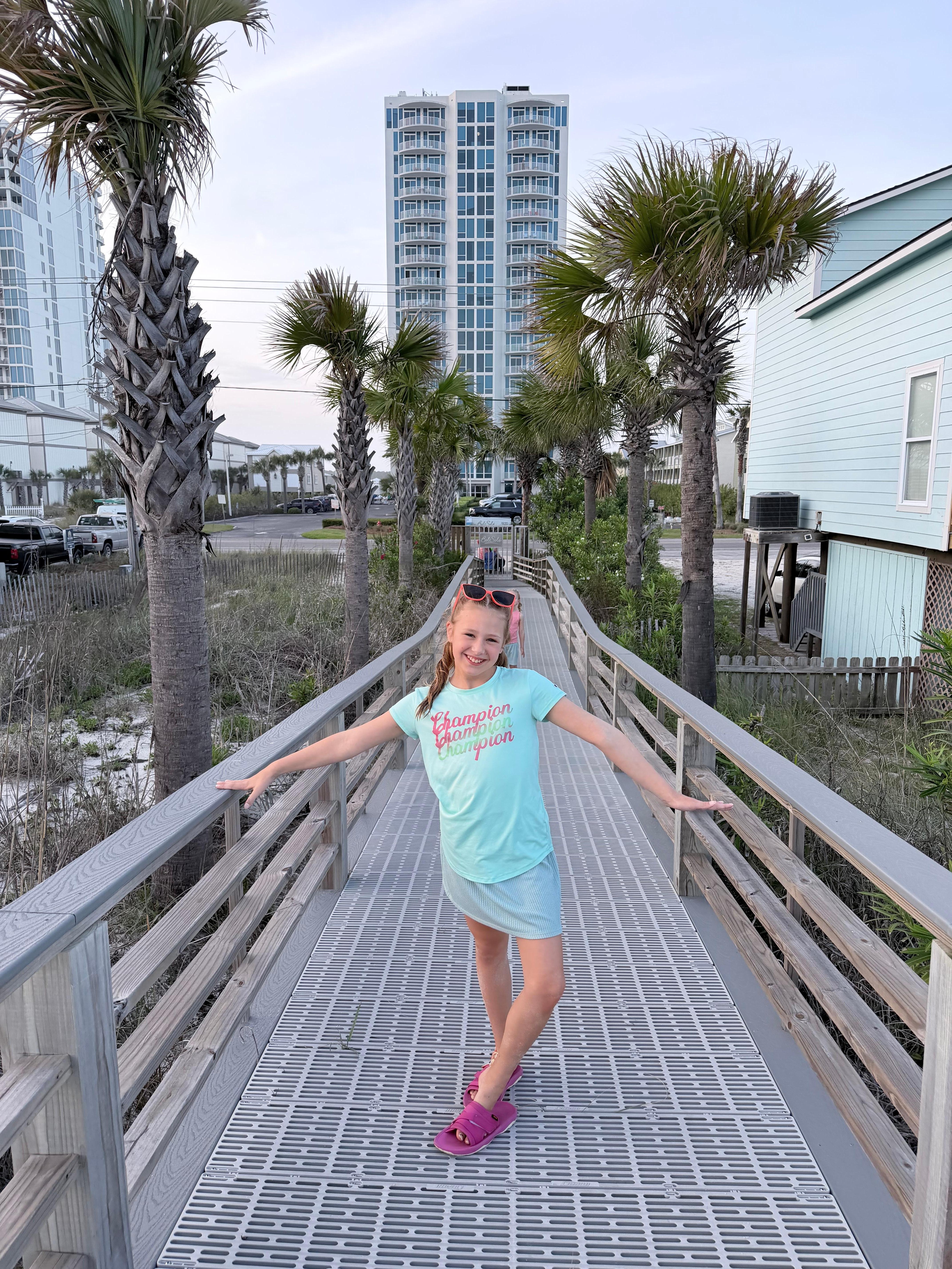 The walkway to the beach. They have a nice shower at the end to wash your get, body and also a hose to rinse off the boards. 