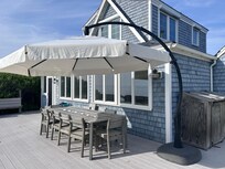 Outdoor dining area easily supporting the 12 of us