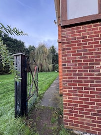 Make your way through the side gate which has no lights