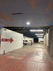 Restored building with unique drive through garage