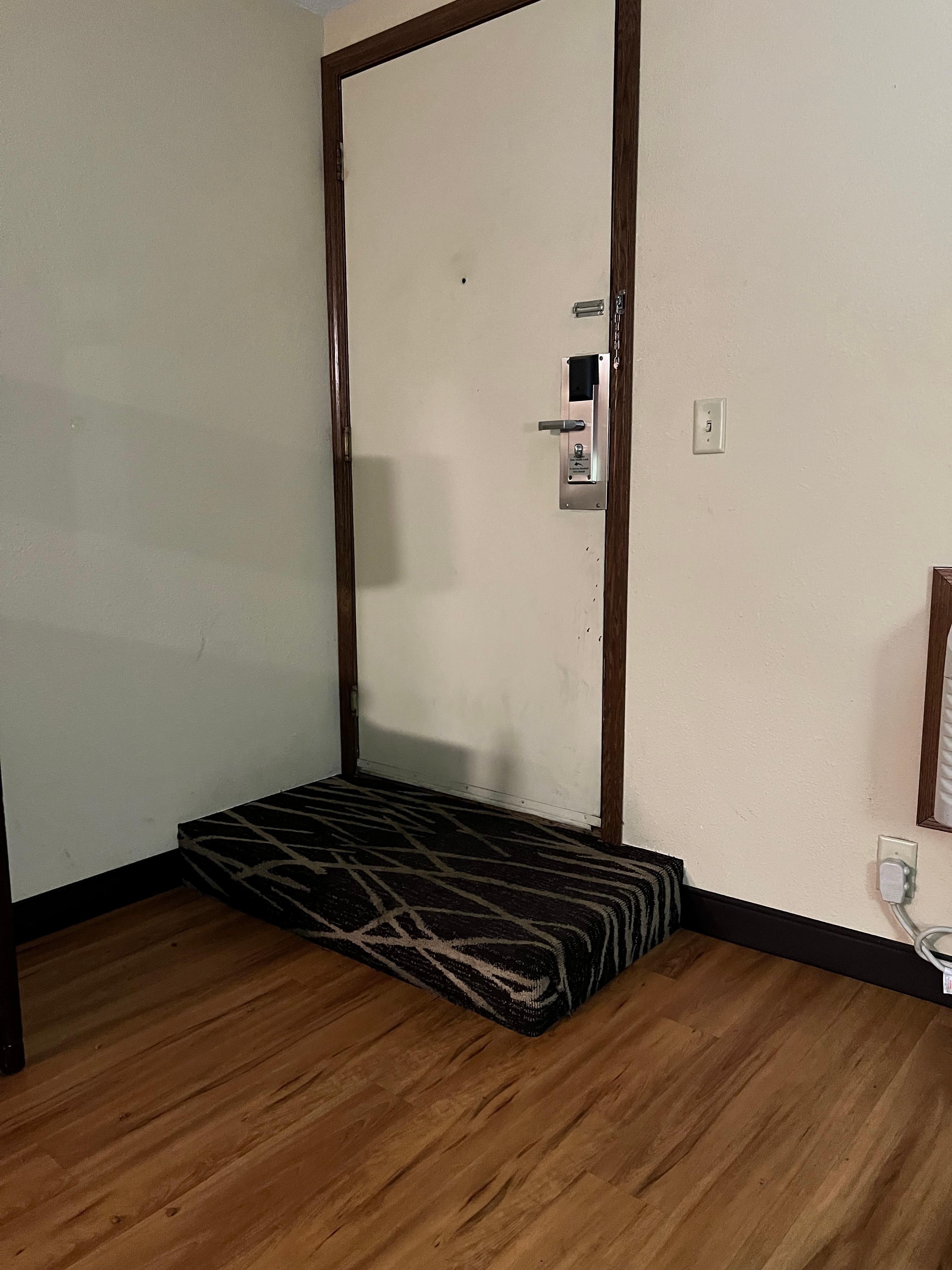 Very dangerous and stupid step inside the door.