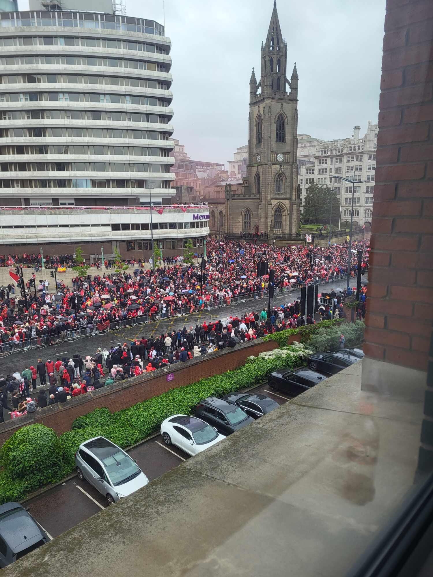 The view from our room of the parade. 