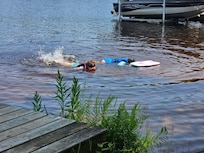 The girls swimming at the beach area.