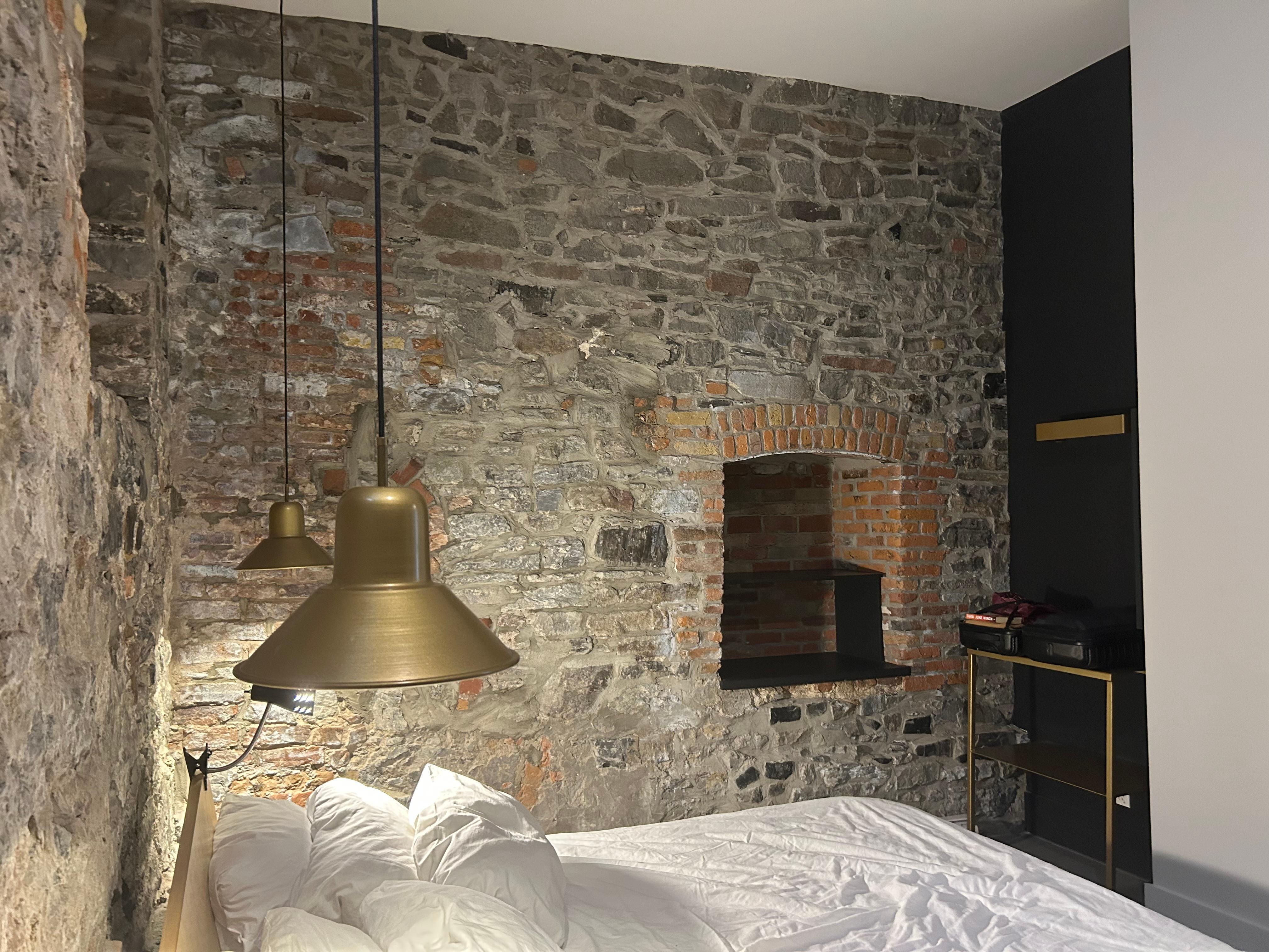 Authentic stone walls in the bedroom and main area kitchen living room.