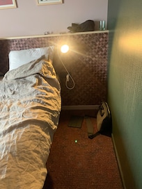 Bedside lamp but no bedside cabinet.