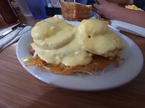 Hefty breakfast. Cornbread Benedict. Definitely can feed 2 people. Shareable portions at southshore Cafe