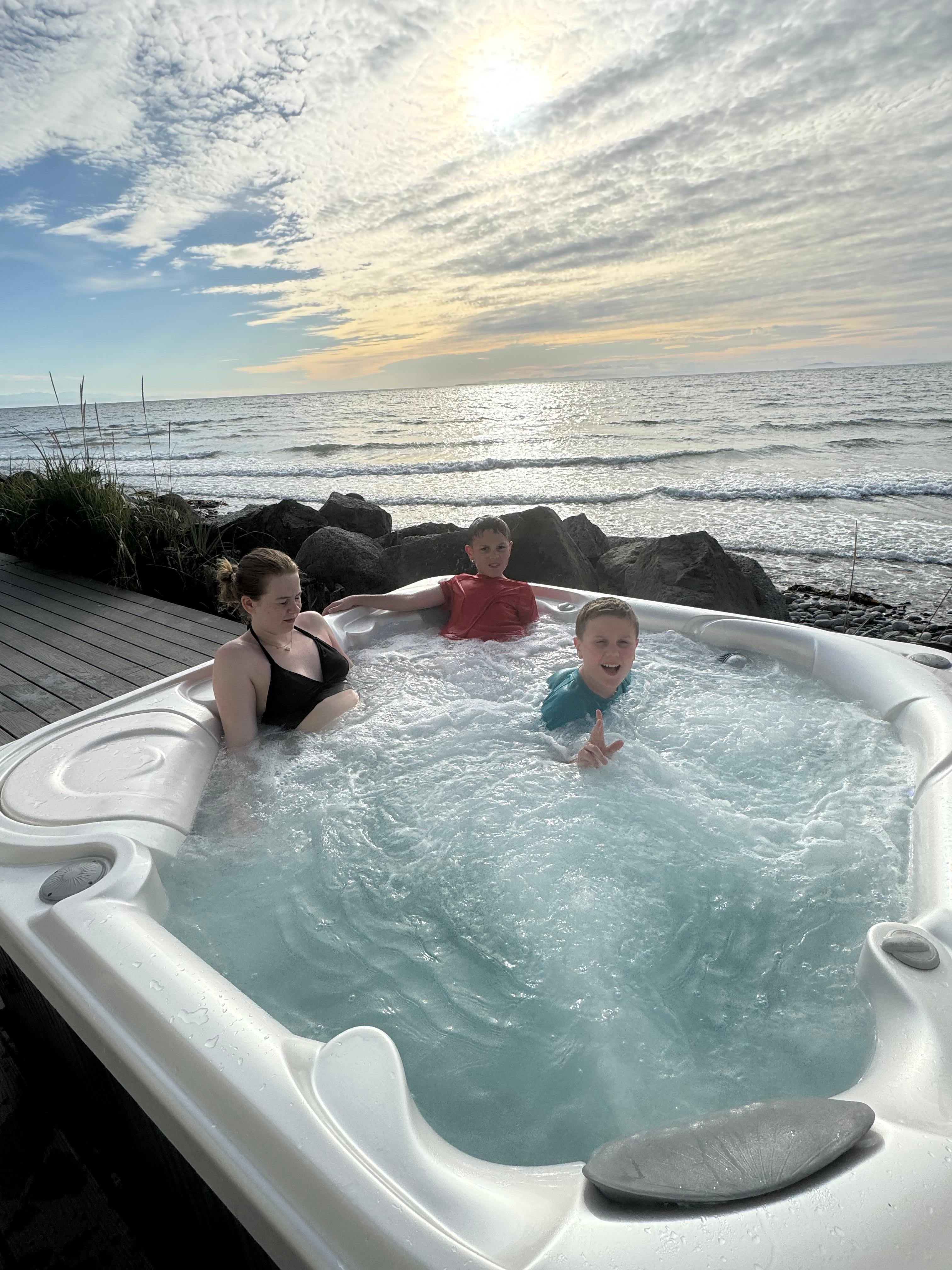 The hot tub overlooking the water is always a highlight of our stay!