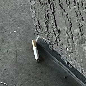 Cigarettes all over the parking lot and common areas.  Some were old and faded, some were recent.