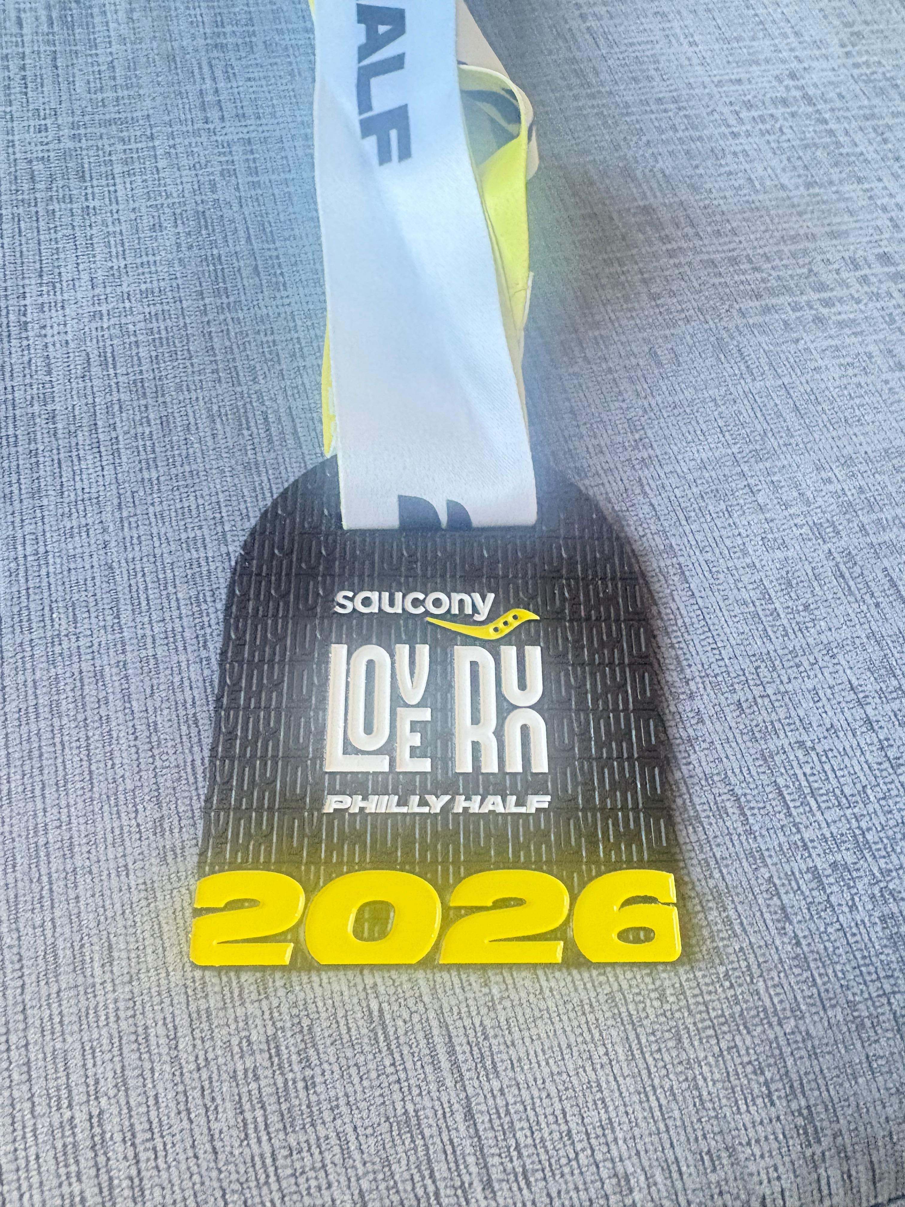Race medal from the Love Half Marathon 