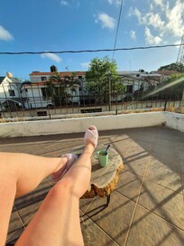 Balcony included with my room - Has a small table and 2 chairs.