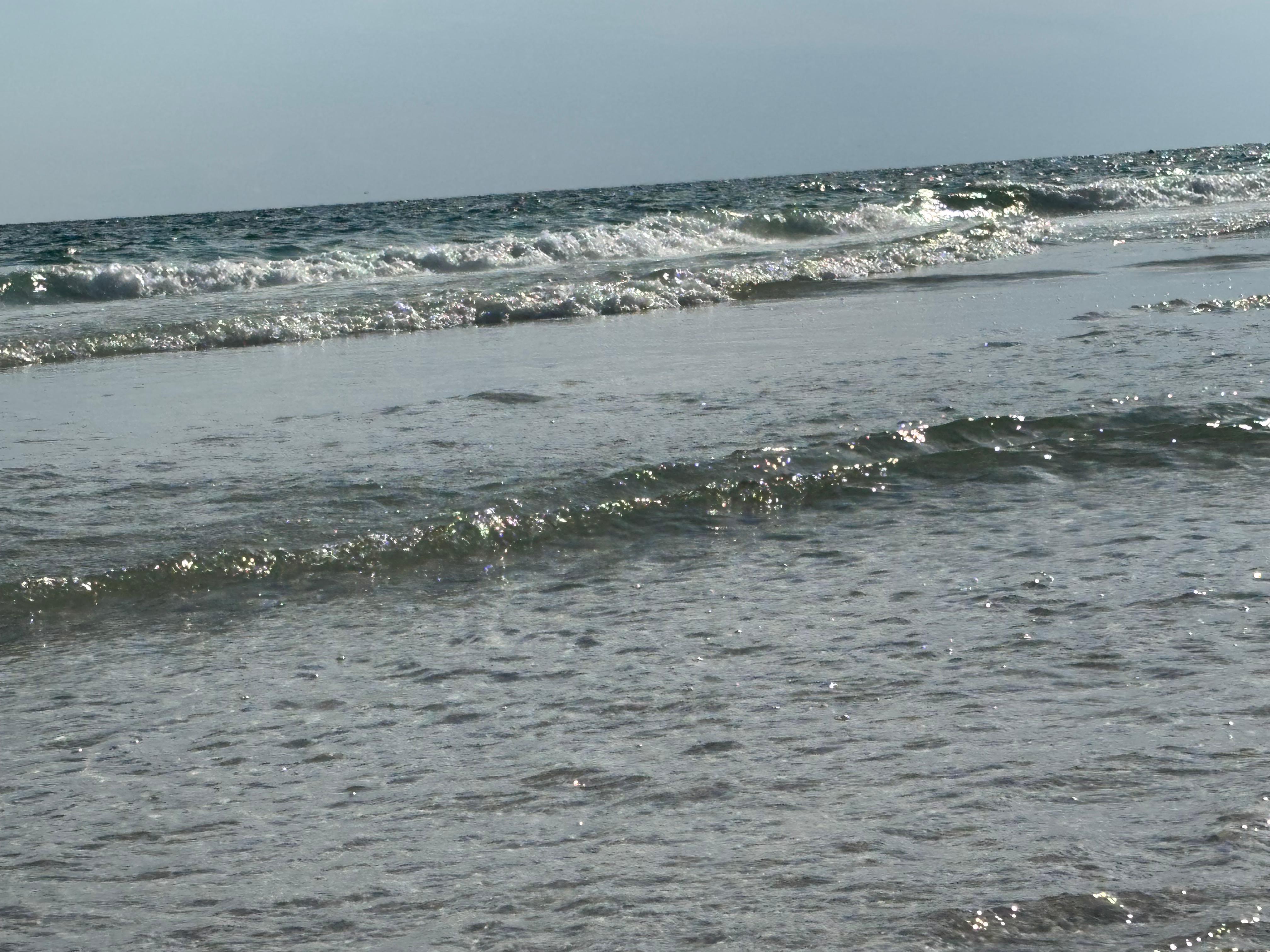 Waves crashing on the beach.