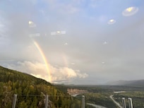 Views of a rainbow from the bar and restaurant.