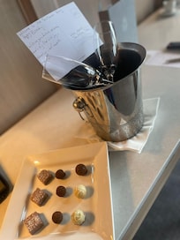 Bottle of fizz and chocolates with a handwritten note as we were celebrating my husband's birthday. A lovely touch.