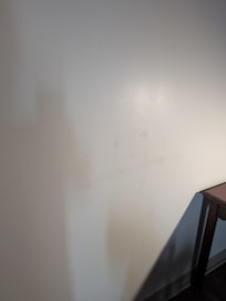 Scuffed wall in room