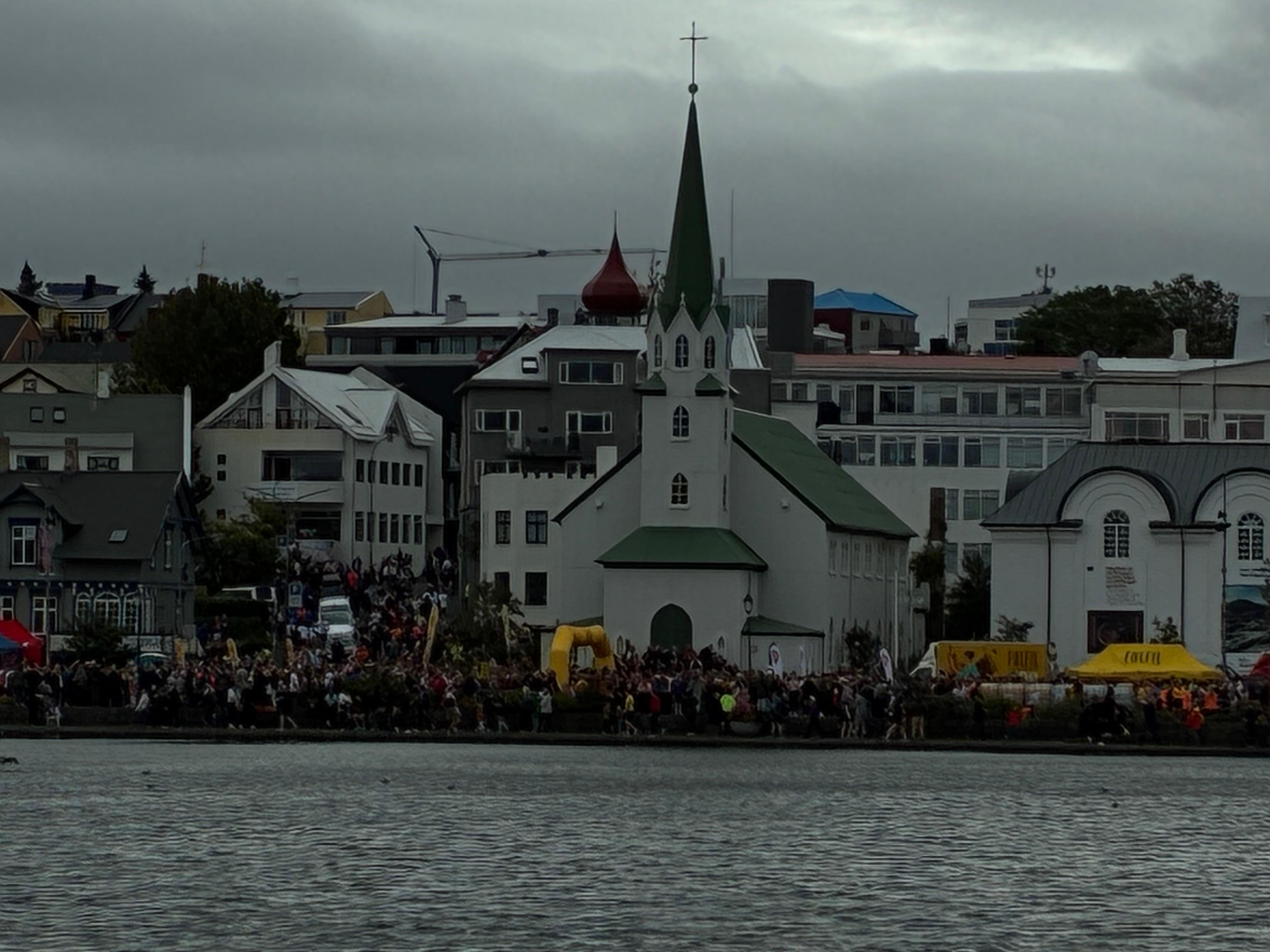 Looking across the Tjurnin at the crowds for the Reykjavik marathon