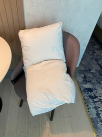 Pillows smelled like wet washing that has never been hung up properly and this one in particular was howling - sweaty, b.o foustieness