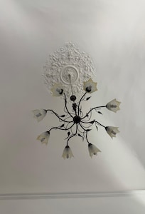 High ceiling a beautiful light fixture