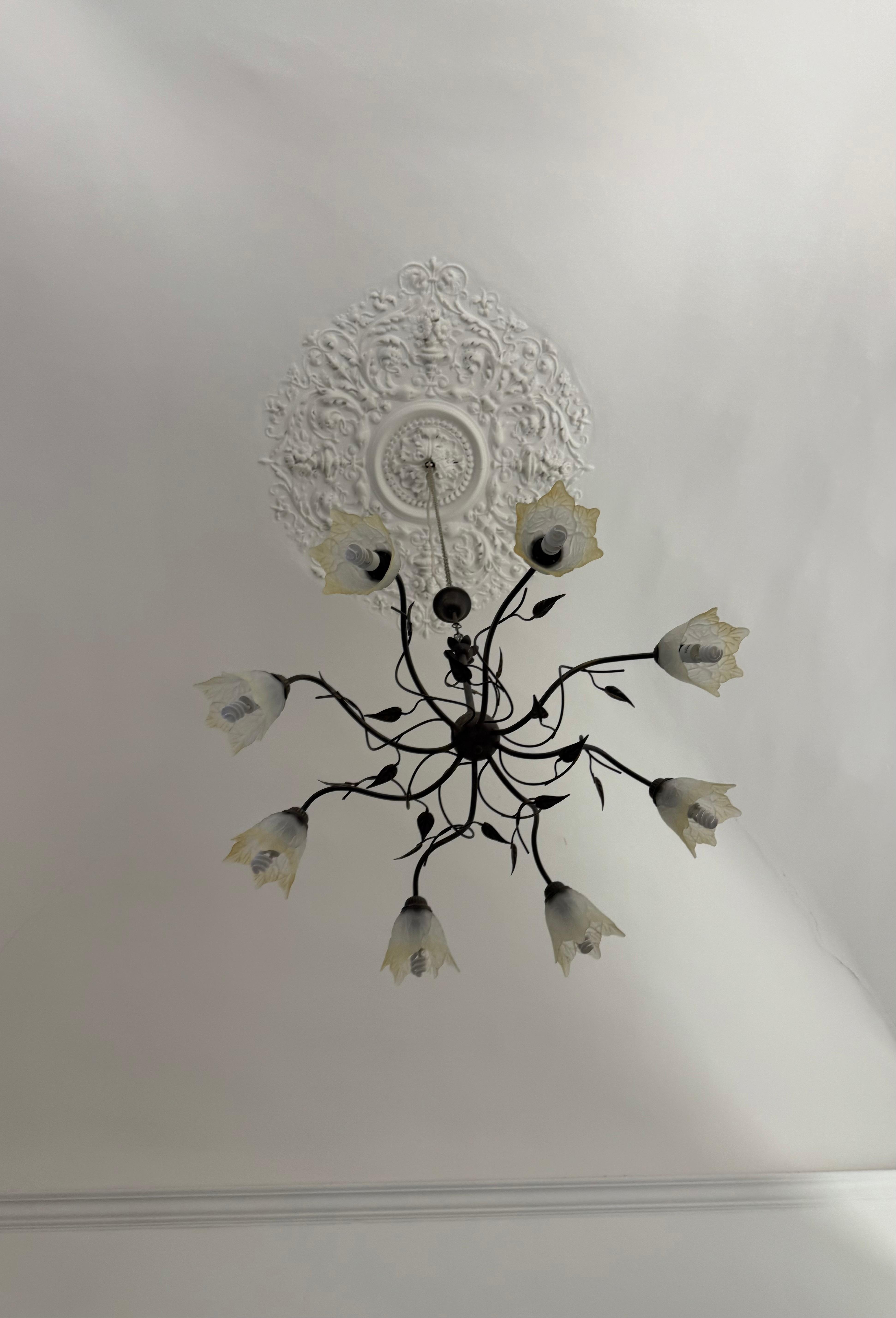 High ceiling a beautiful light fixture
