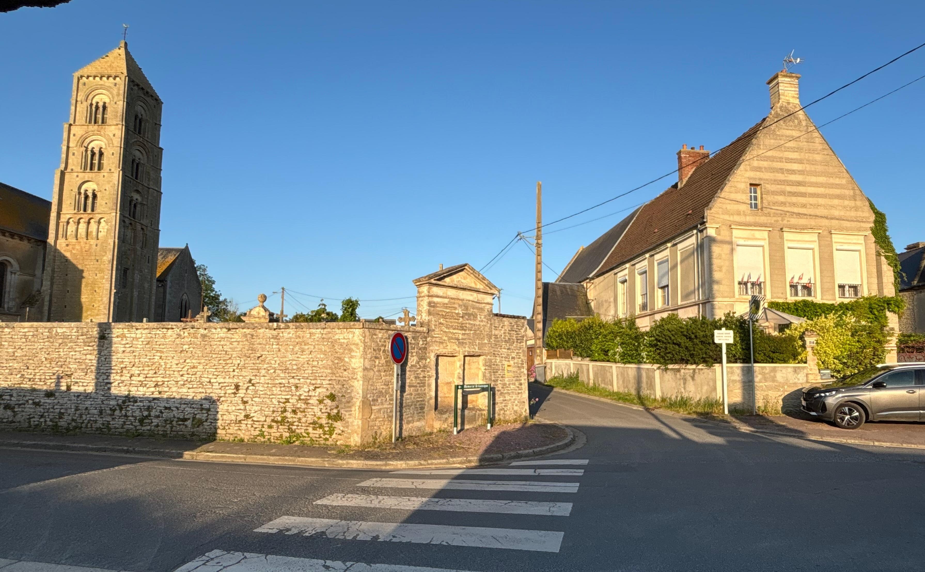 Gite is the front part (brown roof) of the house across the street from church 