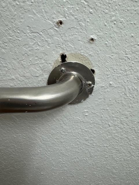 Handicapped bar was not secure