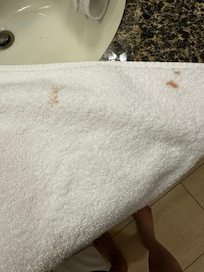 Fresh towel has nasty stain on it