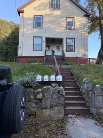 Stairs from the street to the front door.