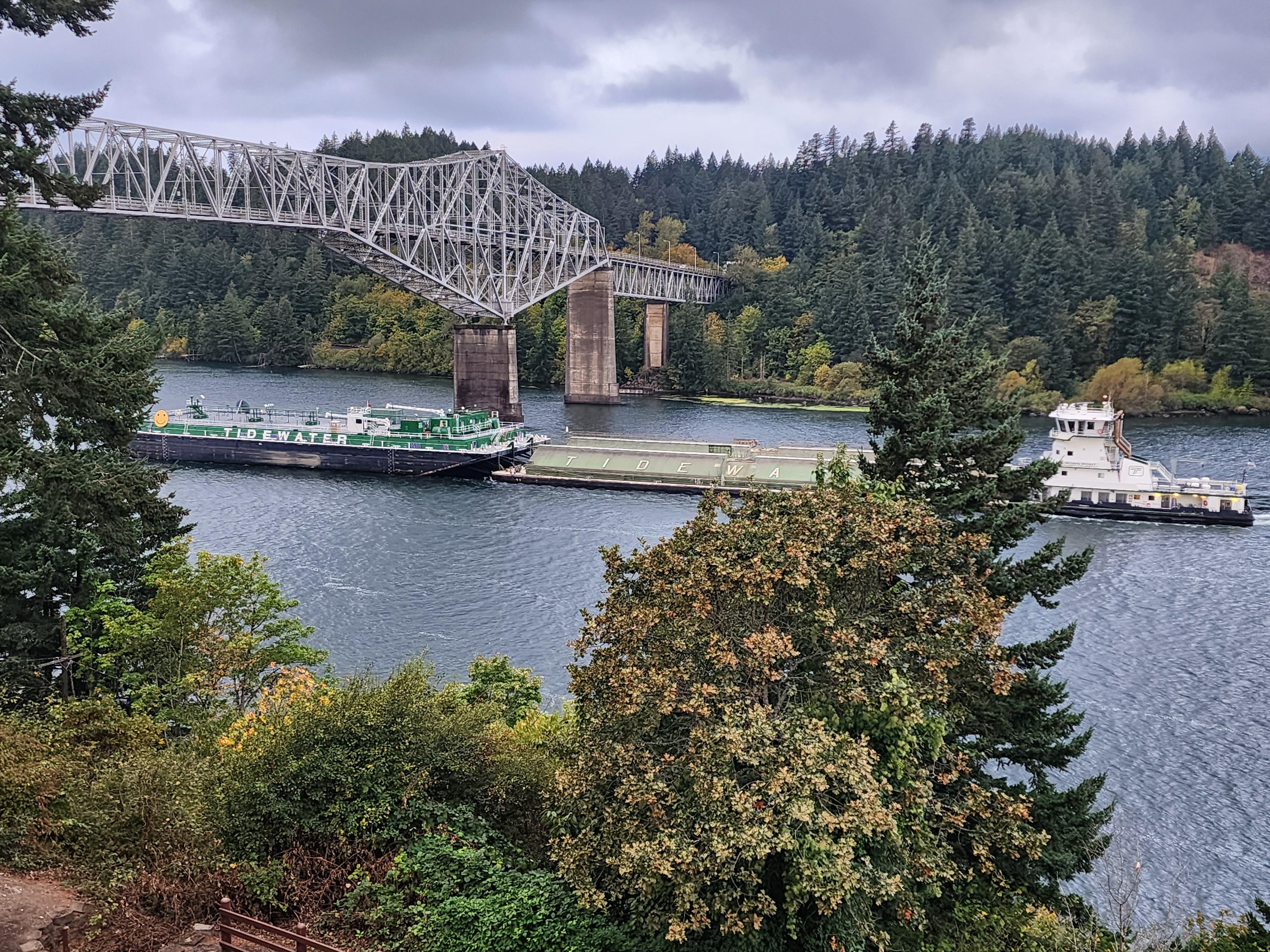 Bridge of the Gods and a barge going under.  From our room balcony