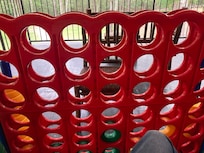 A massive connect four game on the front balcony