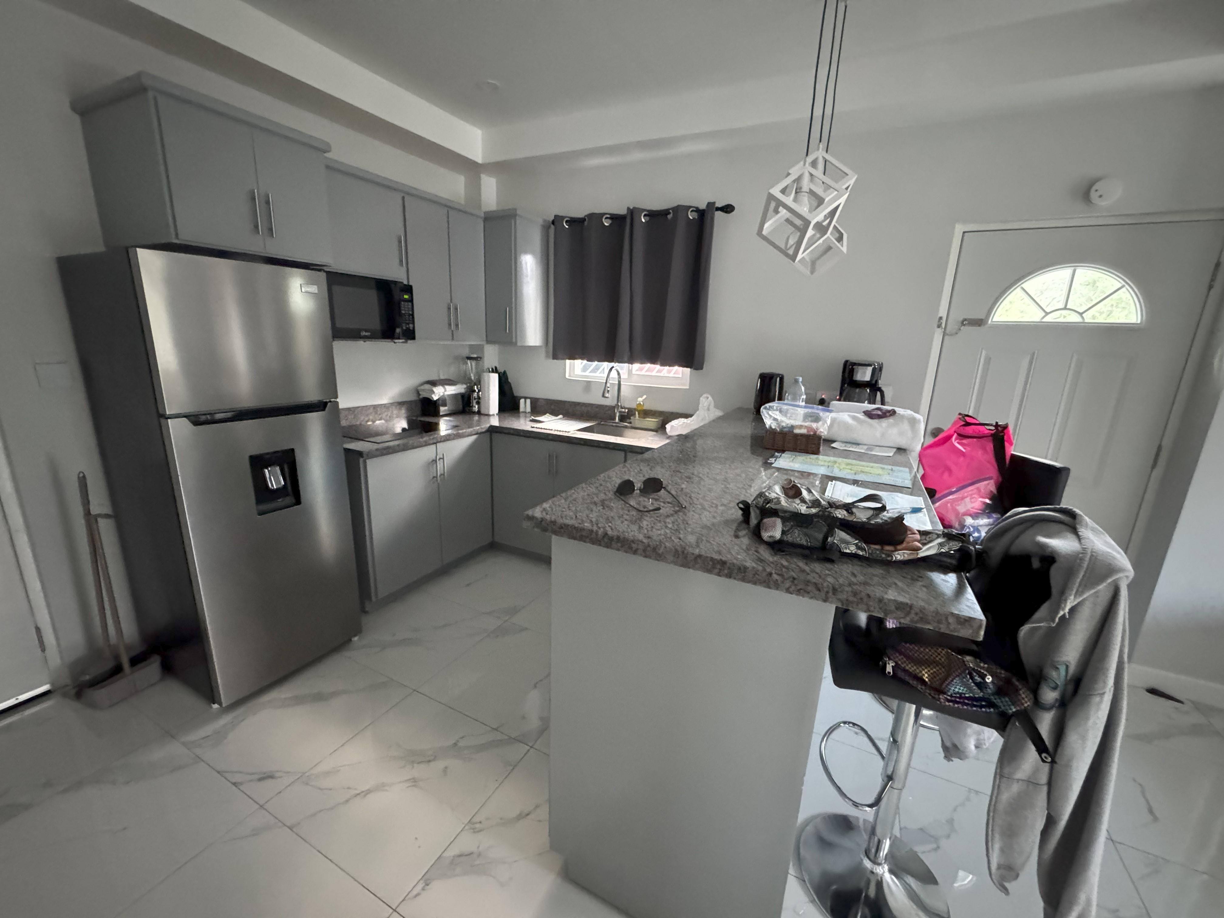 Kitchen (Please ignore our stuff. I forgot to take a pic when we first arrived. Everything was spotless)