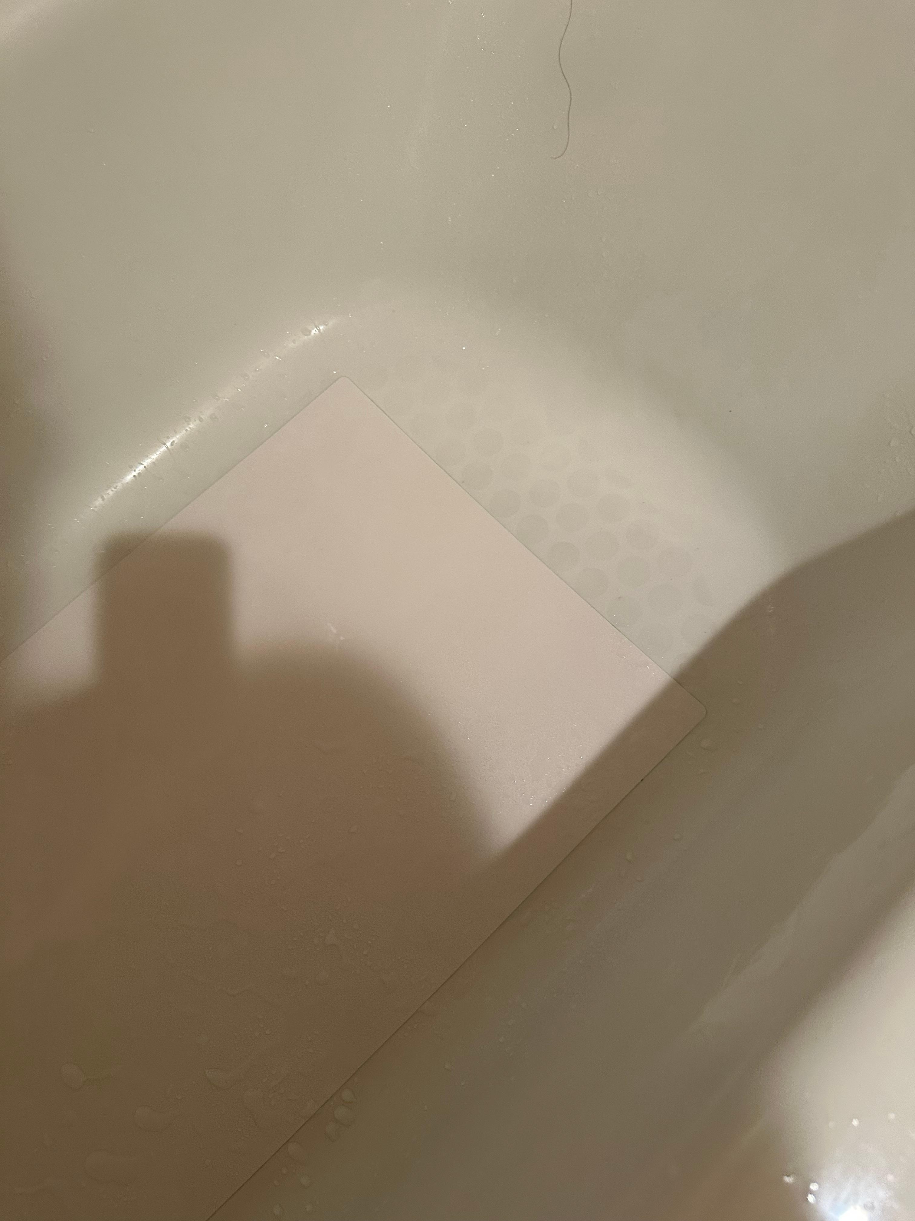 The tub was very dirty - a clean mat on top of a filthy tub doesn't quite do it.