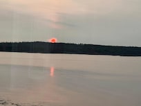 View of the sunrise from the comfort of the house.