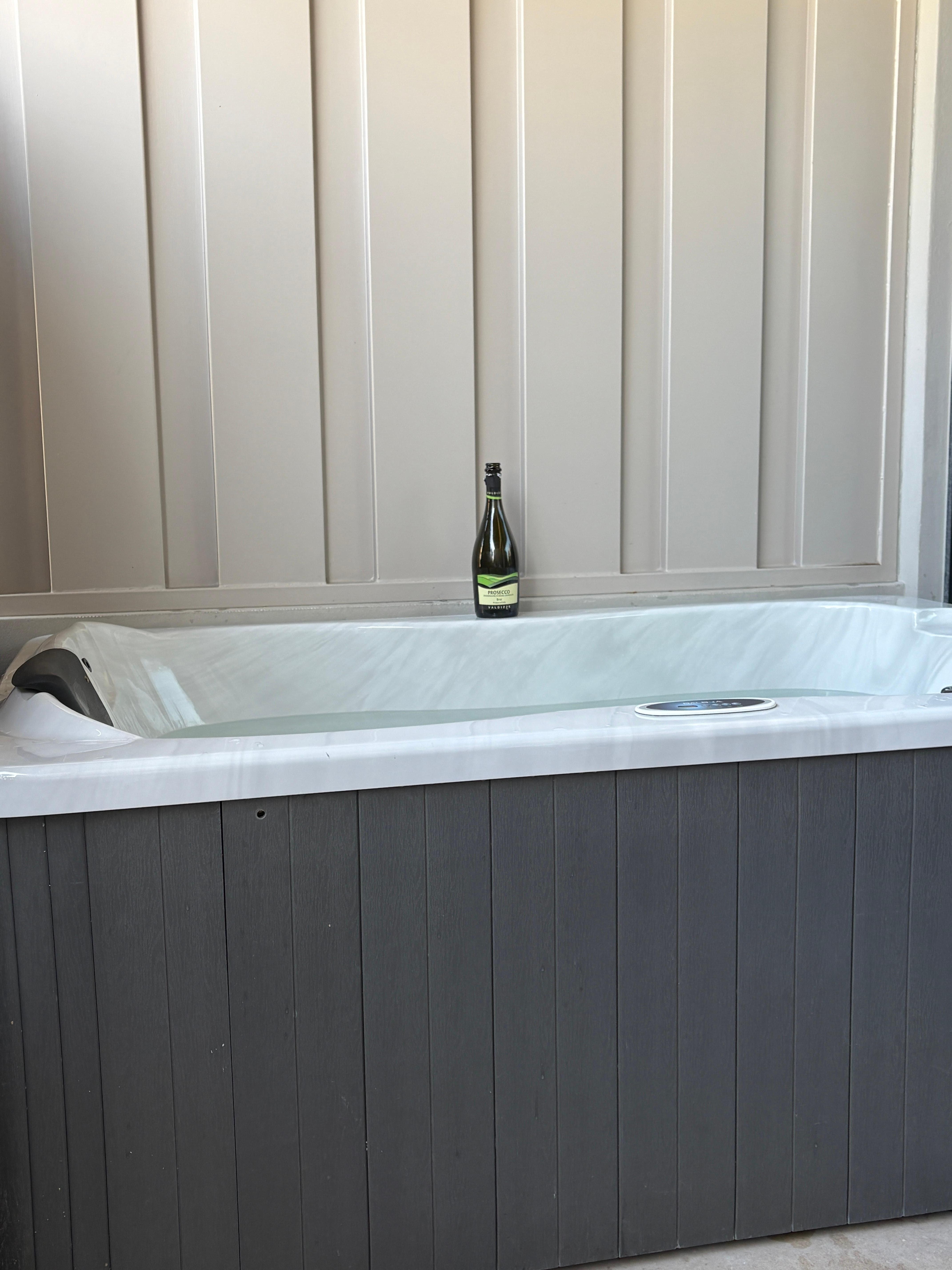 Their Hot Tub; Our Prosecco 