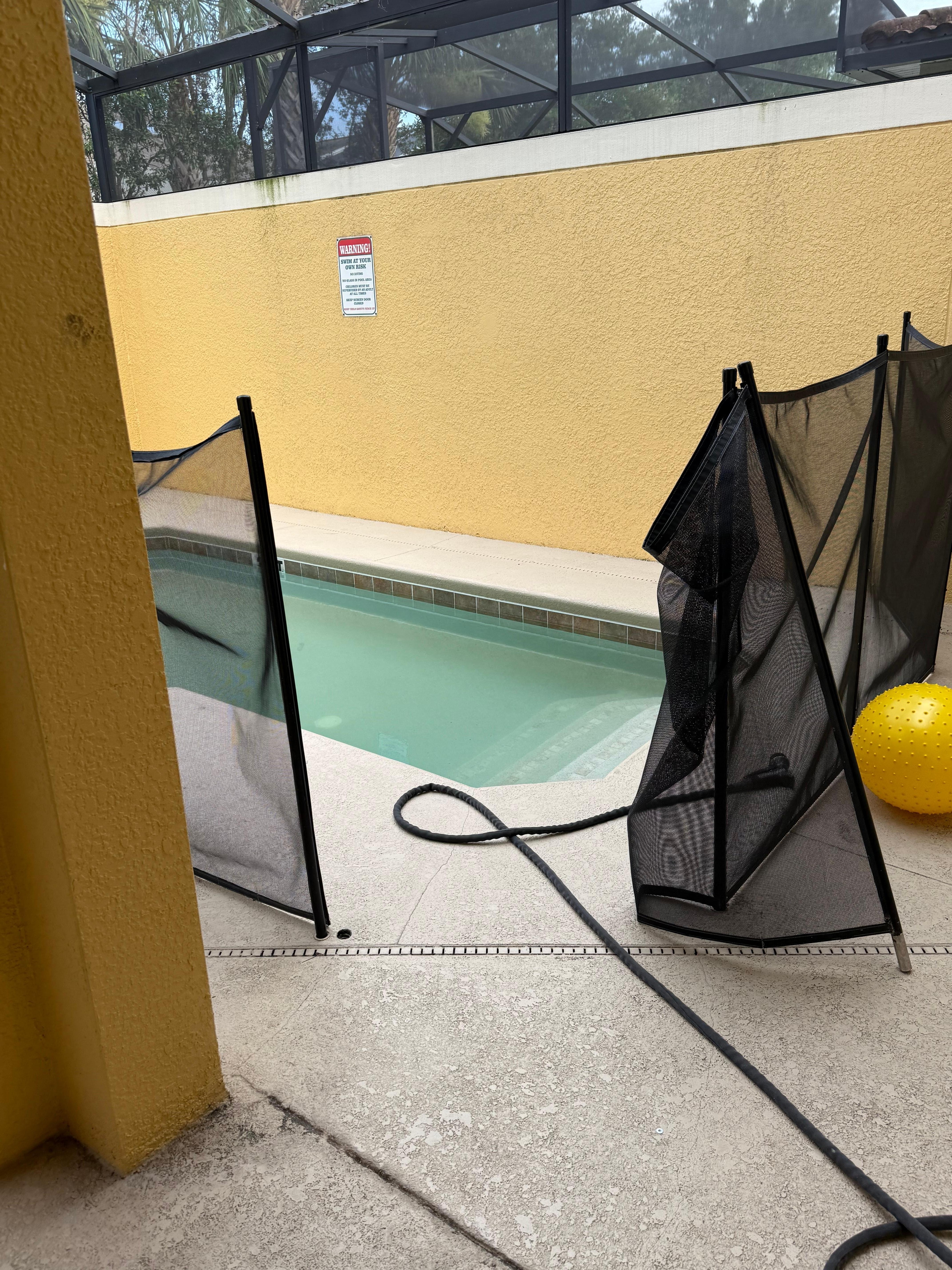 Pool gate was open upon arrival and hose in pool 