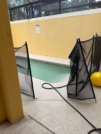 Pool gate was open upon arrival and hose in pool