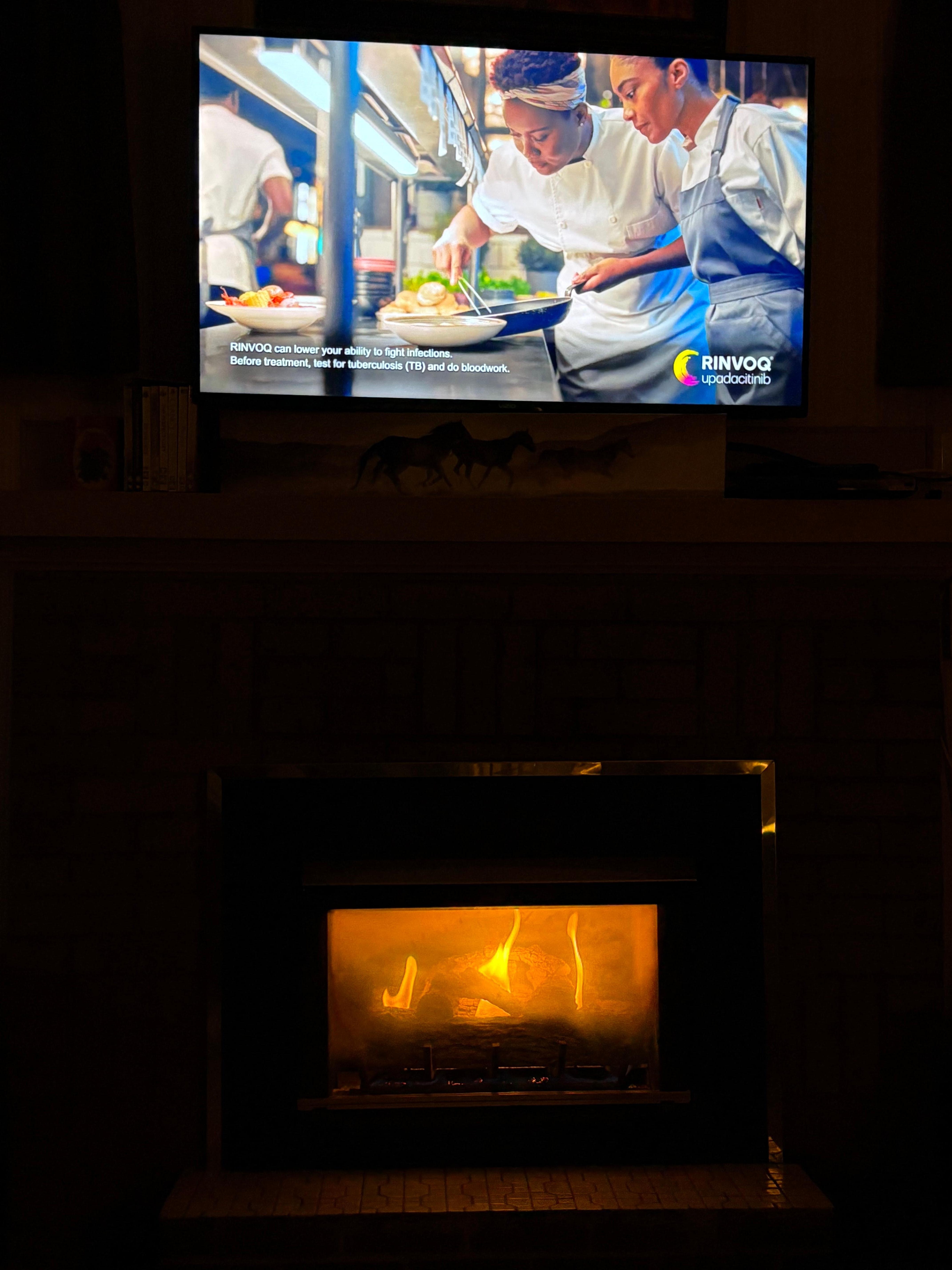 Living room TV and gas fireplace. Easy to use and works like a charm! Lots of furniture nearby!