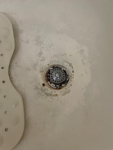 Drain of tub where water drained slowly and you had to stand in a pool of water while showering.