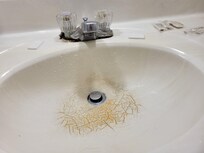 Cracked, dirty sink (1 of 2)